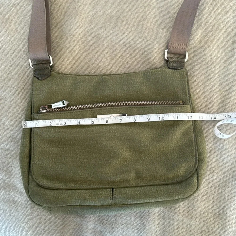 Kipling moss green with colbalt blue lining crossbody bag